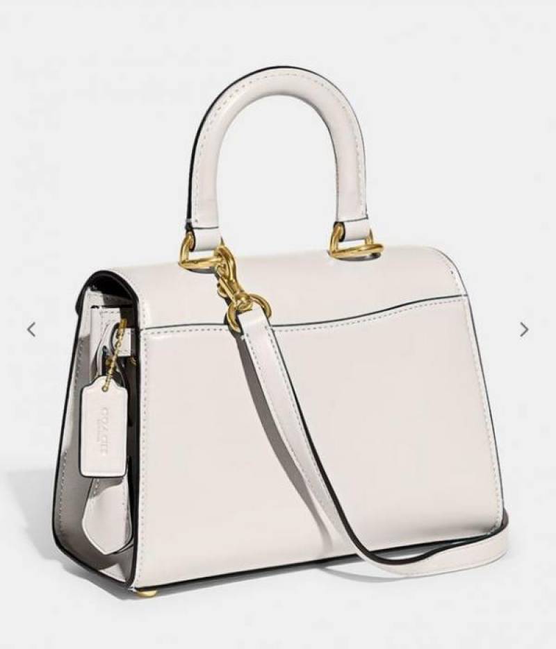 coac_h sammy 21 signature tophandle bag Comes with Extra long sling with box 26979 white