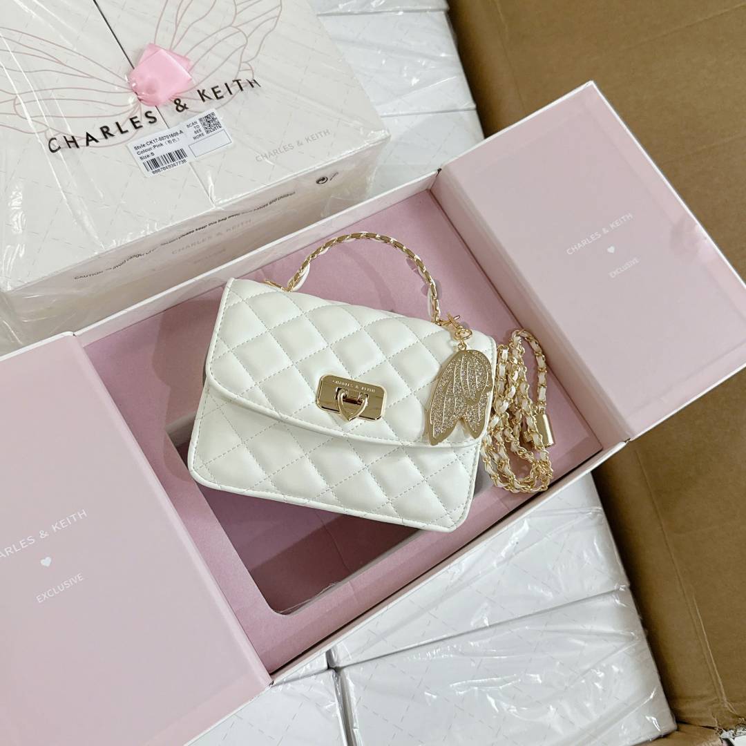 CHARLES_KEITH_Cressida.Quilted.Top.Handle.Bag.With.Bag.Charms_With_Og_Gift_Box_White-50701608